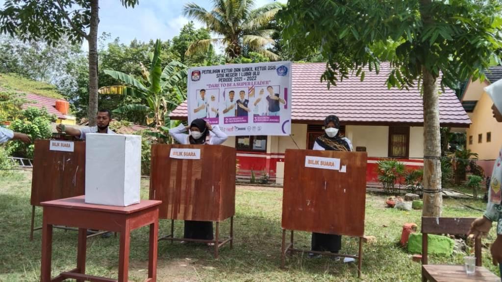 PEMILIHAN DAN PELANTIKAN KETUA OSIS, DAN WAKIL BESERTA PENGURUS OSIS PERIODE 2021 - 2022