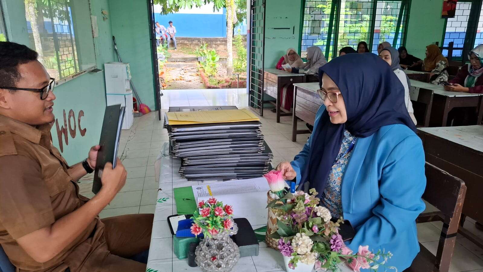 PEMBAGIAN RAPORT MEI 2025