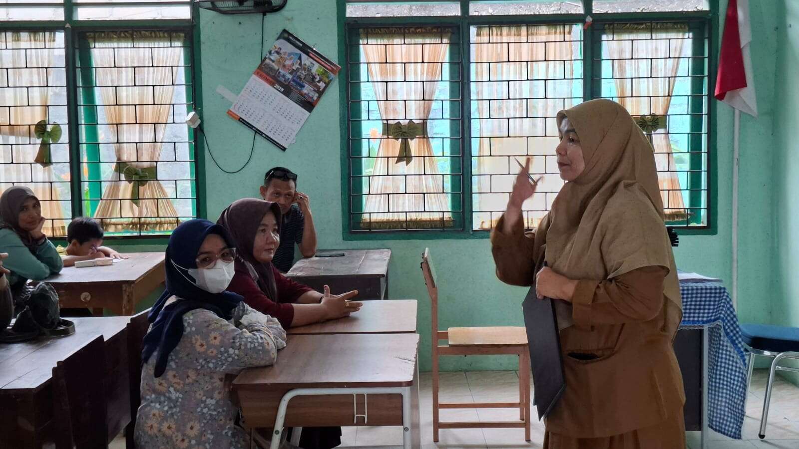 PEMBAGIAN RAPORT MEI 2025