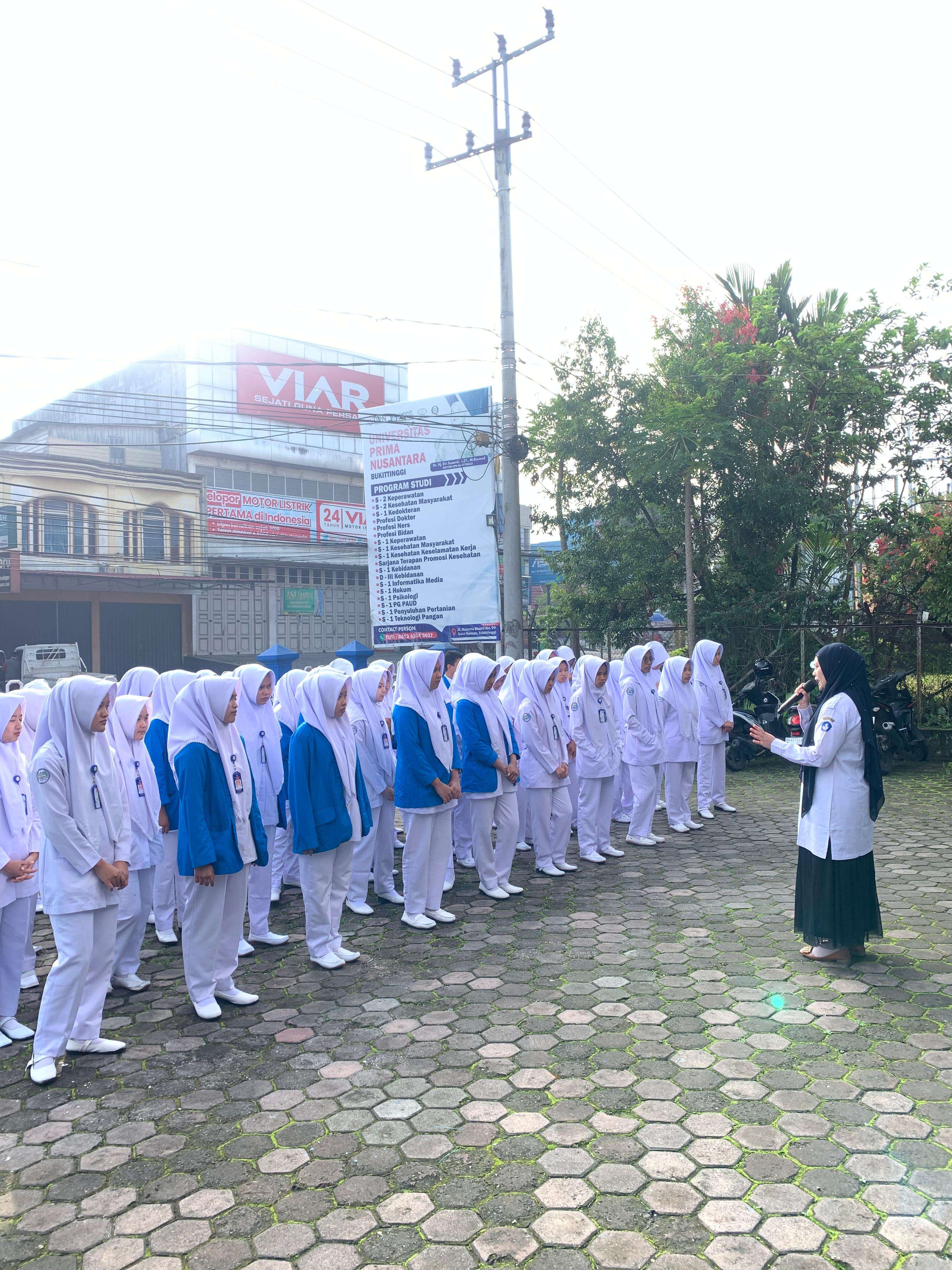 UPACARA BENDERA AWAL MASUK SEKOLAH SEMESTER GENAP SMK KESEHATAN PRIMA NUSANTARA  BUKITTINGGI